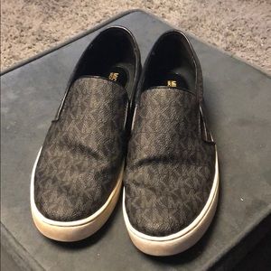 Black Michael Kors slip on shoes